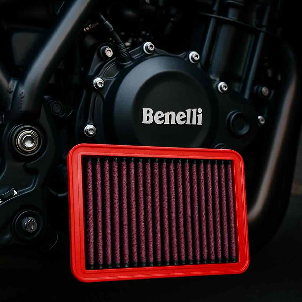 Red BMC flat panel performance air filter in front of a Benelli motorcycle engine – washable, high-flow filter designed for Italian motorcycles.